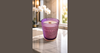 Phoenix Crafted smoky and earthy fragrance candle in a moody woodland landscape composition.