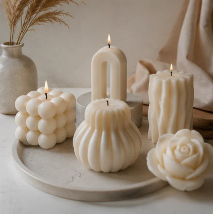 Decorative Candles That Actually Smell Good: How to Choose Beauty, Fragrance, and Performance featuring stylish sculptural designs.