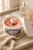 A decorative box of scented tealight & votive candles for a cozy home ambiance.