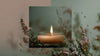 Soothing handmade candles surrounded by delicate flowers, creating a calming ambiance in your space.