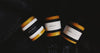 Beeswax candles and wax materials arranged for an educational guide.