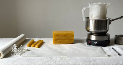 Materials for making best natural beeswax candles 2026, including beeswax, wick, and melting pot.