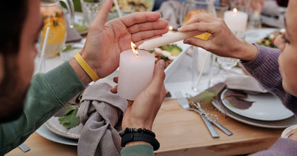 Lit candle illustrating burn time, wax use, and long-term value.