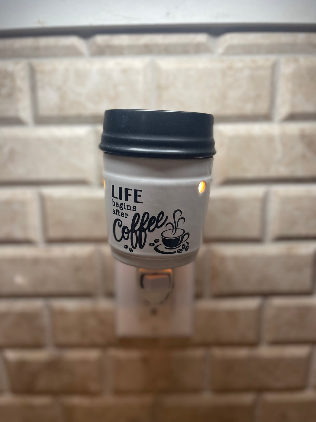 Plug in wax warmers designed like a coffee cup, providing fragrance in your space.