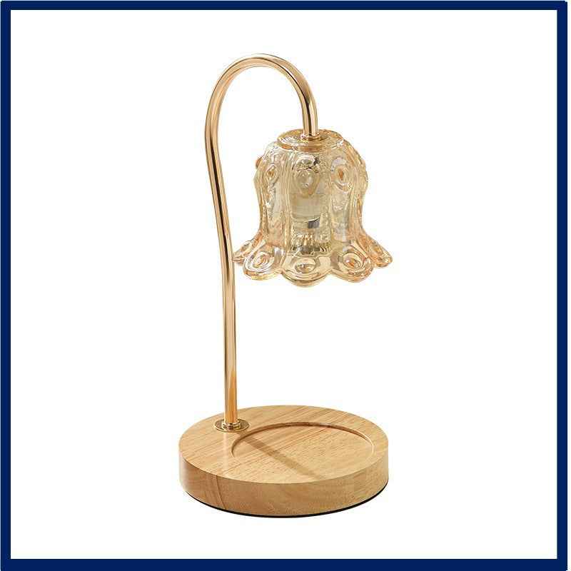 Lily of the Valley solid wood candle warmer lamp with glass shade for dimmable ambient lighting.