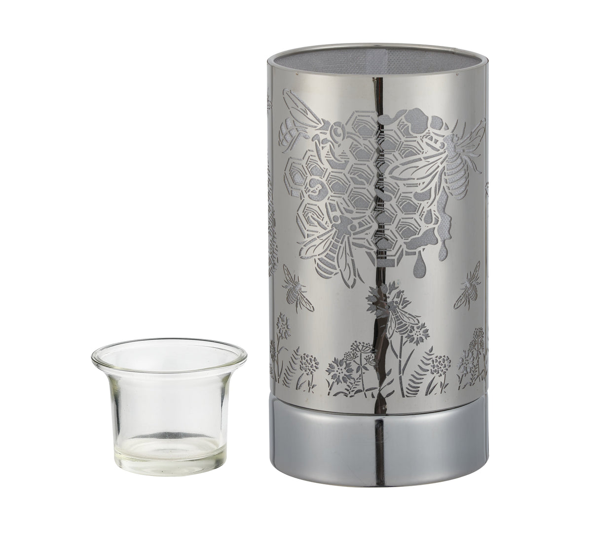 Silver cylindrical metal wax warmer with laser-cut honeybee, hexagon and floral pattern; clear glass cup positioned left