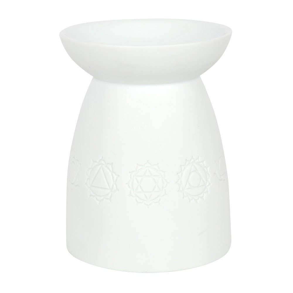 White Ceramic Seven Chakra Tealight Wax Warmer features a sleek design and chakra symbols for aromatic infusion.