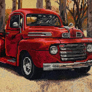 Autumn Haul Diamond Painting of a vintage red truck in a fall scene surrounded by trees and autumn colors.