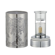 Silver cylindrical metal shade with laser-cut honeybee and floral pattern at left.