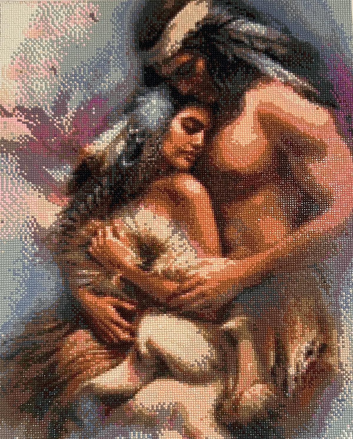 Sacred Embrace Diamond Painting featuring two figures in a loving embrace with vibrant colors and intricate details.