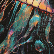 Close-up diamond painting of a jellyfish with yellow-orange bell and flowing teal, turquoise, purple and orange tentacles on a black background