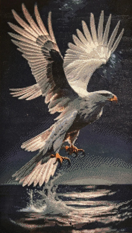Stunning Nightfall Hunter Diamond Painting featuring a bald eagle in flight over water.