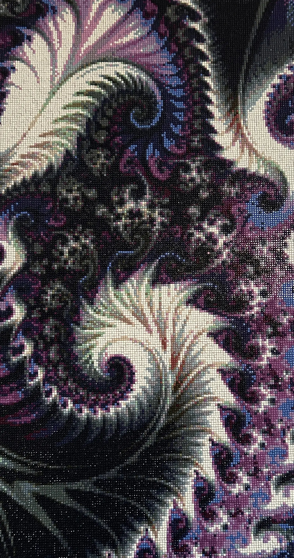 Violet Feather Fractal Diamond Painting featuring luminous purple and teal designs in a mesmerizing pattern.
