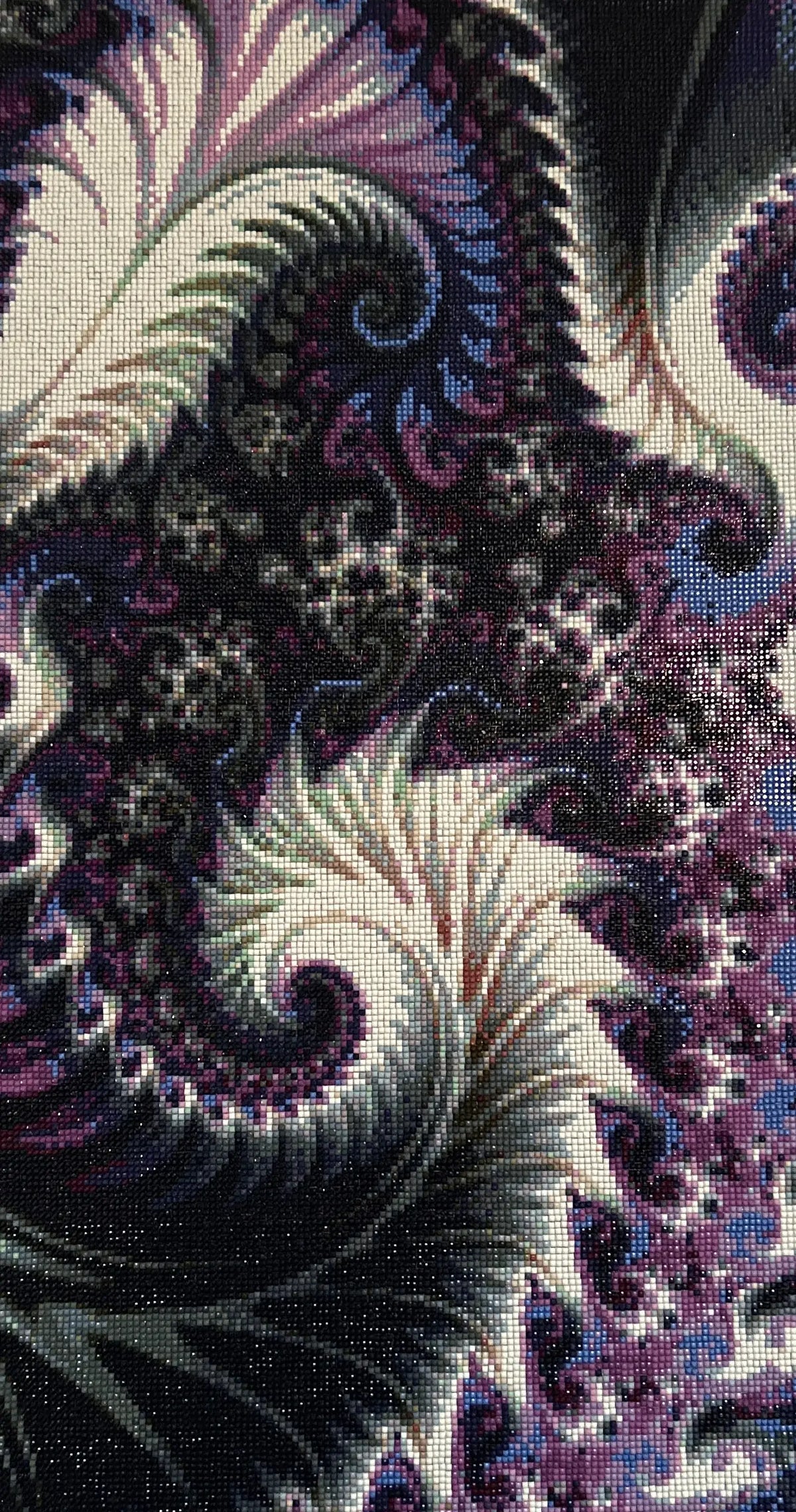 Violet Feather Fractal Diamond Painting featuring luminous purple and teal designs in a mesmerizing pattern.