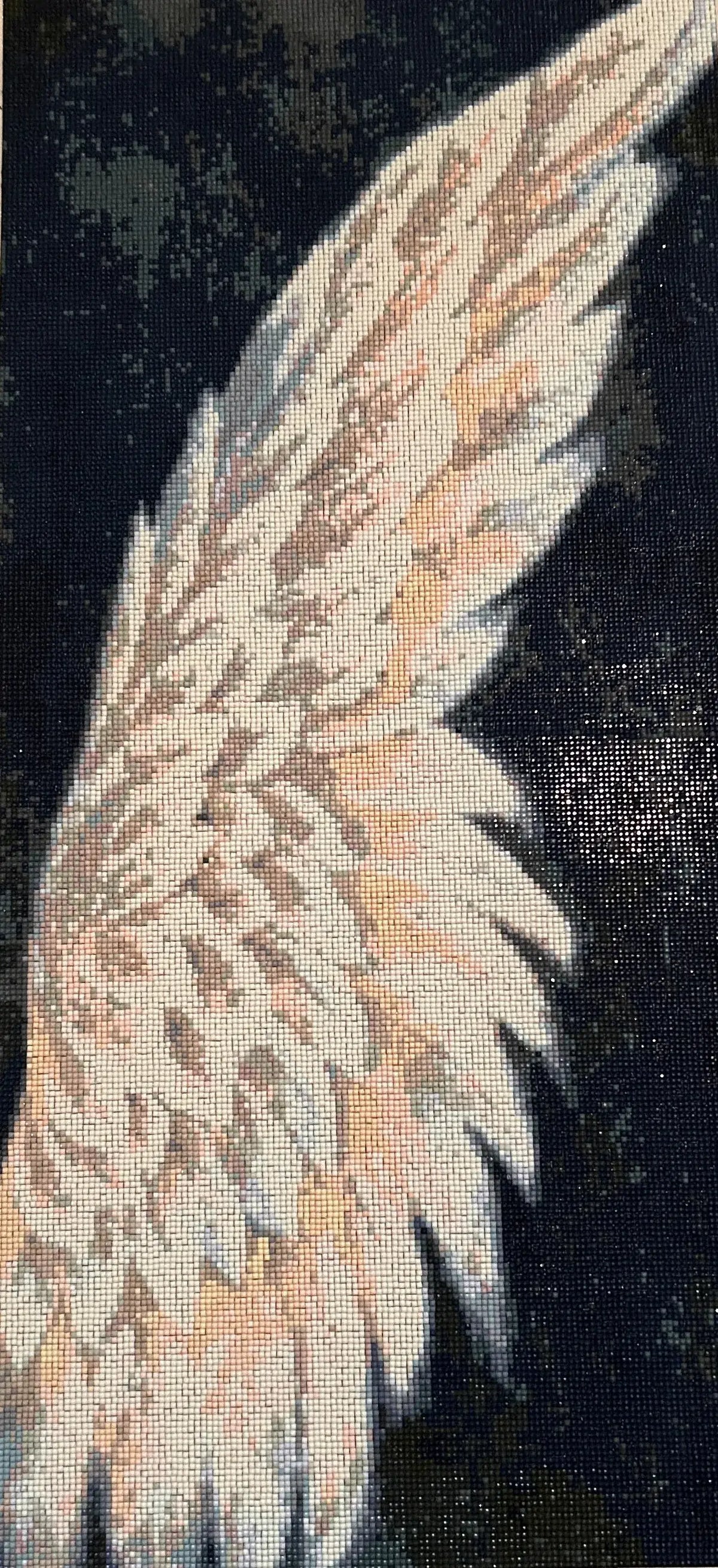 Seraphic Wing Diamond Painting featuring a luminous mosaic wing in soft whites and blush against a dramatic backdrop.
