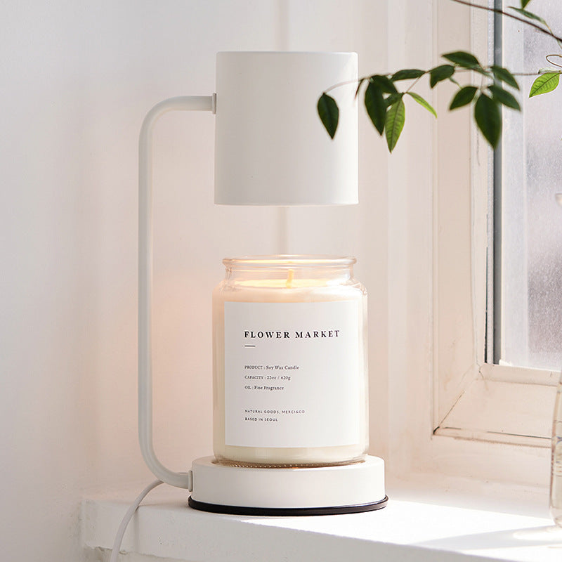 Modern Dimmable Candle Warmer Lamp warming a jar candle without flame in a stylish, minimalist setting.