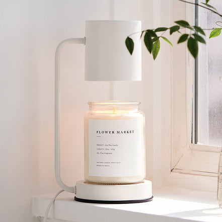 Modern Dimmable Candle Warmer Lamp warming a jar candle without flame in a stylish, minimalist setting.