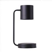 Modern Dimmable Candle Warmer Lamp in sleek black metal design for ambient lighting and candle warming.