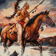 Close-up diamond painting of a rider wearing a feathered headdress and armbands.