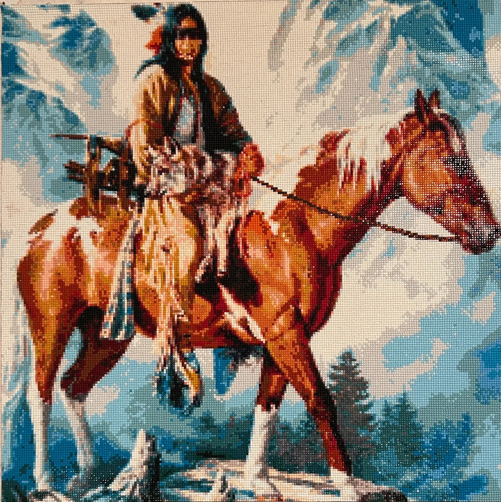 Spirit of the Mountain Diamond Painting featuring a horse rider against a mountainous backdrop.