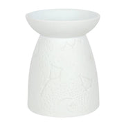 Matte white ceramic tealight warmer, front view; shallow top bowl on a conical base embossed with constellations, stars, and a crescent moon.