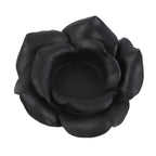 Black rose tealight candle holder made of resin, intricately crafted for elegant home decor.
