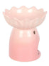 Glossy light-pink ceramic wax warmer with scalloped water-lily bowl atop a rounded hollow base featuring circular cutouts.