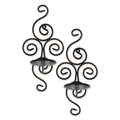 Scrollwork candle sconces featuring elegant swirling designs, perfect for adding ambiance to any space.