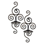 Scrollwork candle sconces featuring elegant swirling designs, perfect for adding ambiance to any space.
