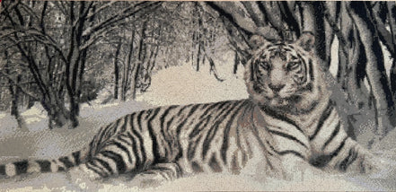 Grayscale diamond-painting close-up of a reclining tiger in a snowy forest, visible square drills and sparkling facets.
