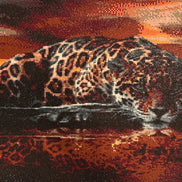 Sunset Watcher Diamond Painting of a leopard by the water at sunset with vibrant colors and lifelike detail.
