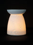 White Ceramic Constellation Tealight Wax Warmer featuring celestial design and warm glow.