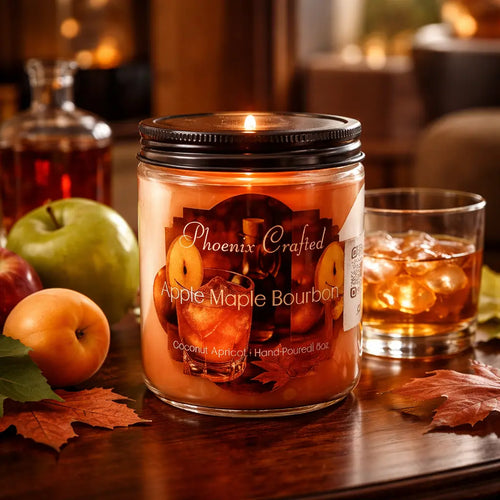 Apple Maple Bourbon candle by Phoenix Crafted with warm autumn colors and cozy atmosphere.