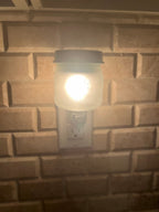 Plug In Warmers & Jumbled Joy Wax Melts - plug in wax warmers with fragrance melts in a cozy home setting.