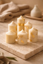 Bamboo Coconut Candle collection displayed on a textured stone surface with a minimalist background.