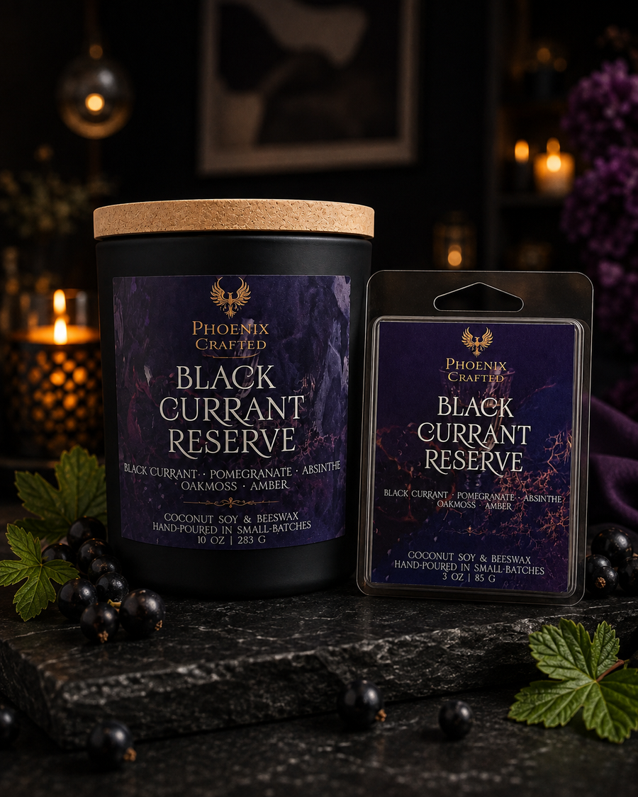 Black Currant Reserve candle and matching wax melts arranged together as a Phoenix Crafted gift set.
