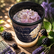 Black Raspberry Vanilla candle displayed with berry-inspired styling.