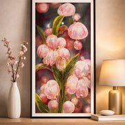 Blossom Glow Diamond Painting displayed on a shelf, featuring vibrant pink flowers and green leaves in a stylish setting.