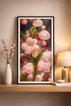 Blossom Glow Diamond Painting displayed on a shelf, featuring vibrant pink flowers and green leaves in a stylish setting.