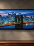 Brooklyn Bridge Nights finished cityscape diamond artwork shown in a wide frame mockup; artwork is sold unframed.