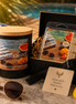 Butt Naked candle and matching wax melts arranged together as a coordinated Phoenix Crafted gift set.