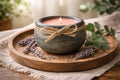 Butterscotch & Bourbon Candle in a rustic bowl with lavender on a wooden tray, evoking a cozy ambiance.