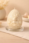 Whimsical Bunny Egg Candle with detailed bunny and floral carvings, perfect for Easter décor and spring styling.