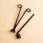 Candle care tool set featuring wick trimmer, snuffer, and dipper for optimal candle maintenance.