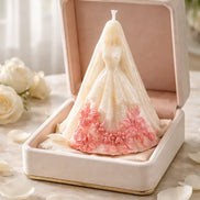 Caramel Apple Creme tiered decorative candle with floral details.