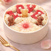 Caramel Apple Creme decorative candle with floral wax details.