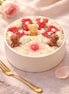 Caramel Apple Creme decorative candle with floral wax details.