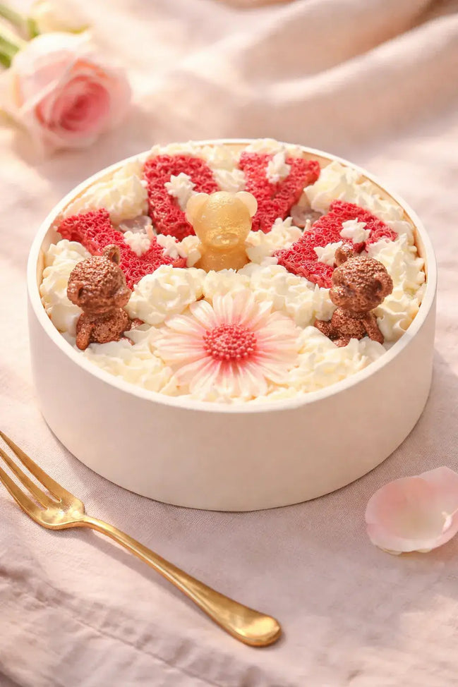 Caramel Apple Creme decorative candle with floral wax details.