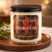 Cedar Lily Candle in a glass jar with vibrant floral label on a wooden tray.