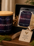 Cedarwood candle and matching wax melts arranged together as a coordinated Phoenix Crafted gift set.